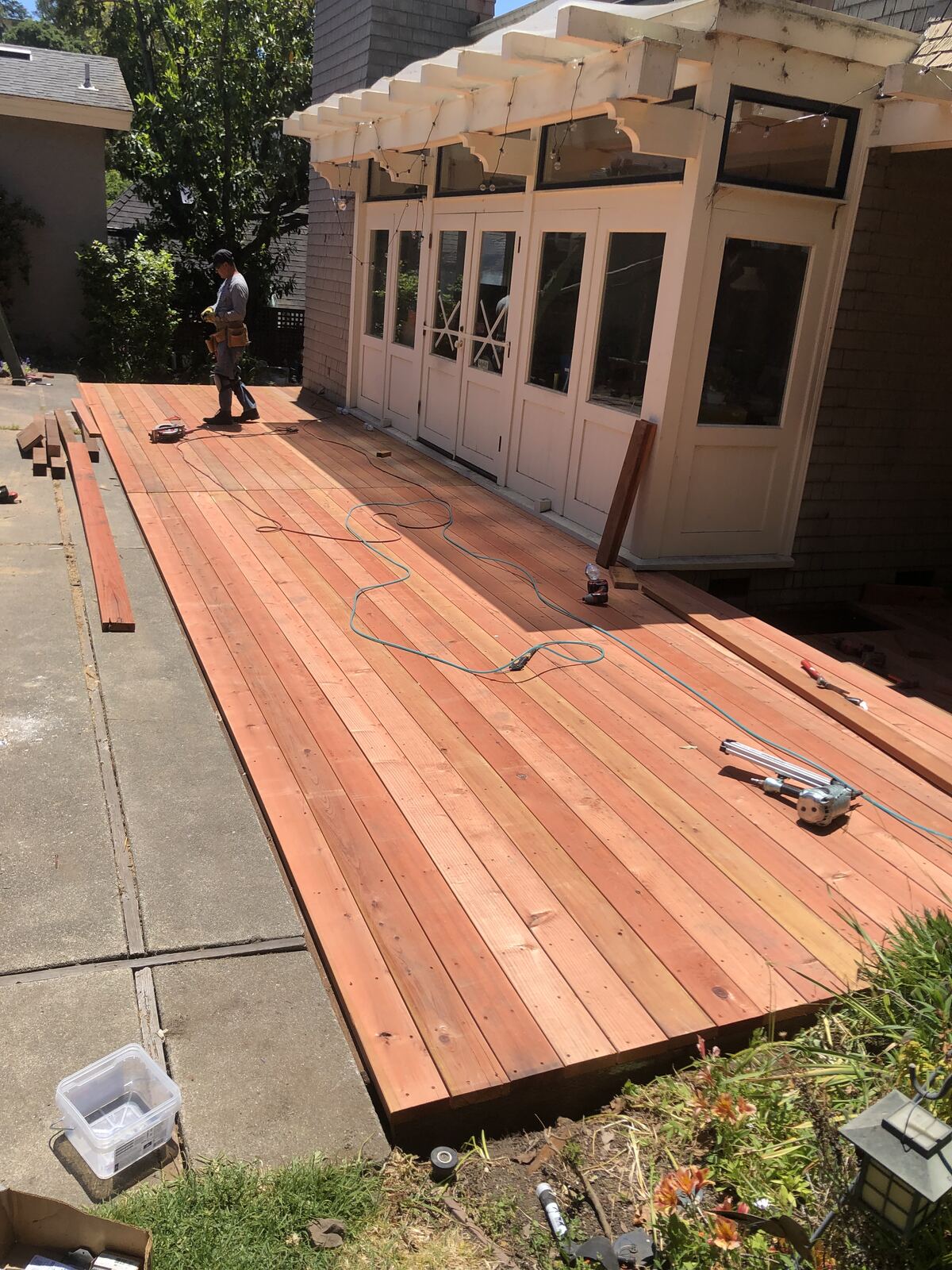 Finished deck attached to house, matching siding