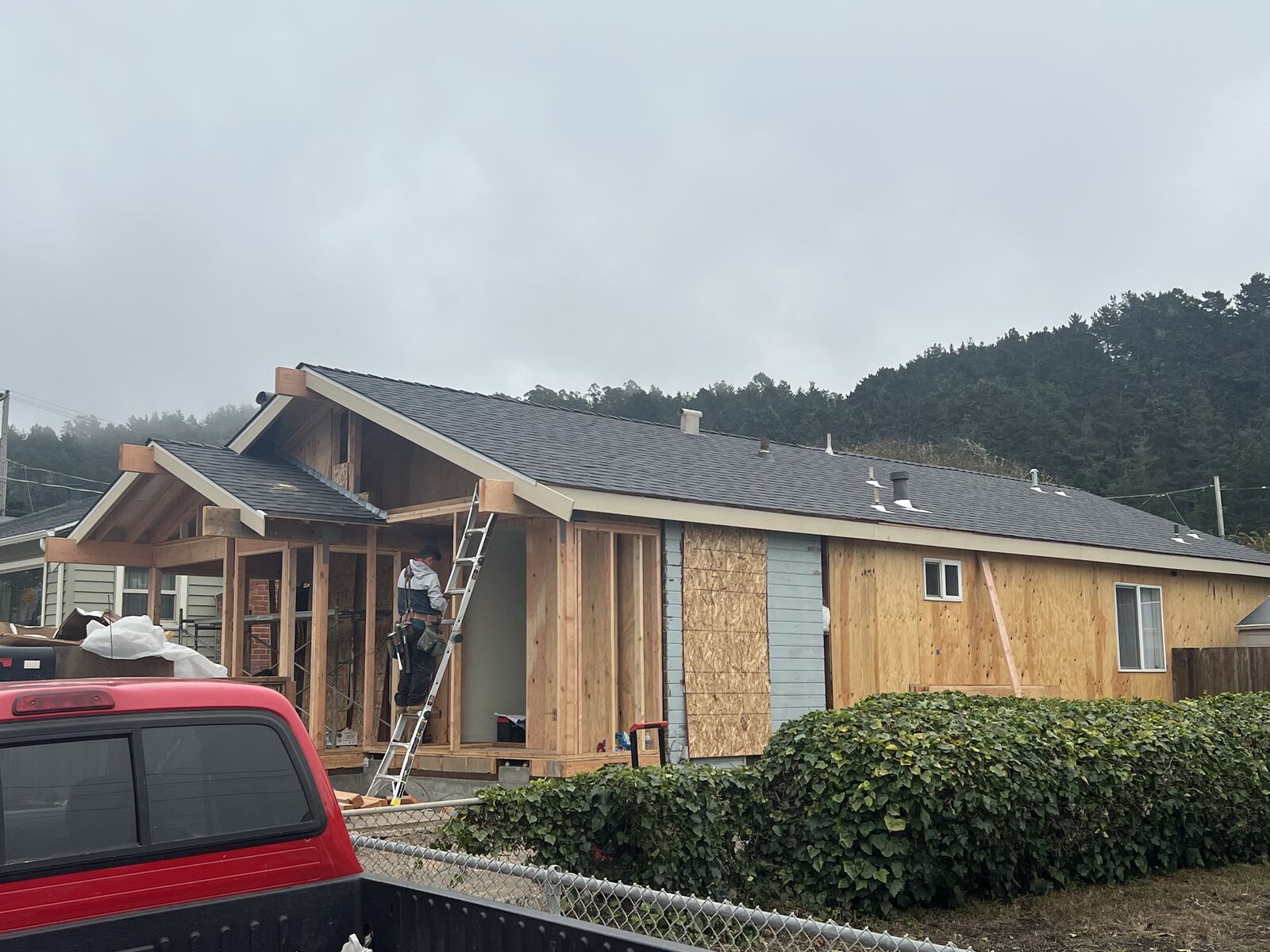 Home addition under construction with framing complete